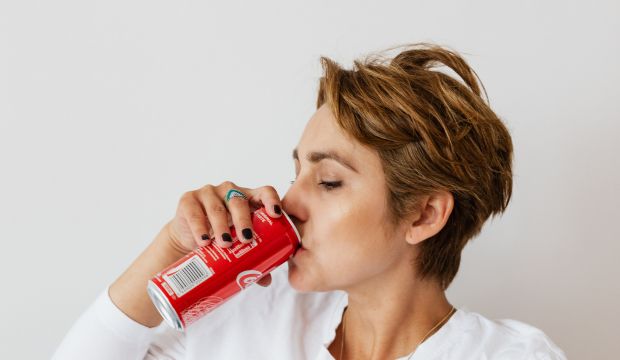women drinking coca cola