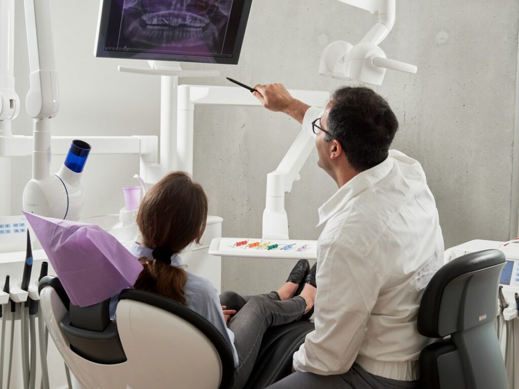 Stock photograph of a dental consultation; illustrative image, not a Dental Krafts patient.